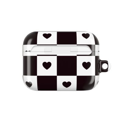 Black and white checkered AirPods case with heart motifs, stylish protective accessory for wireless earphones. Perfect for adding a trendy, love-themed touch to your tech gear.