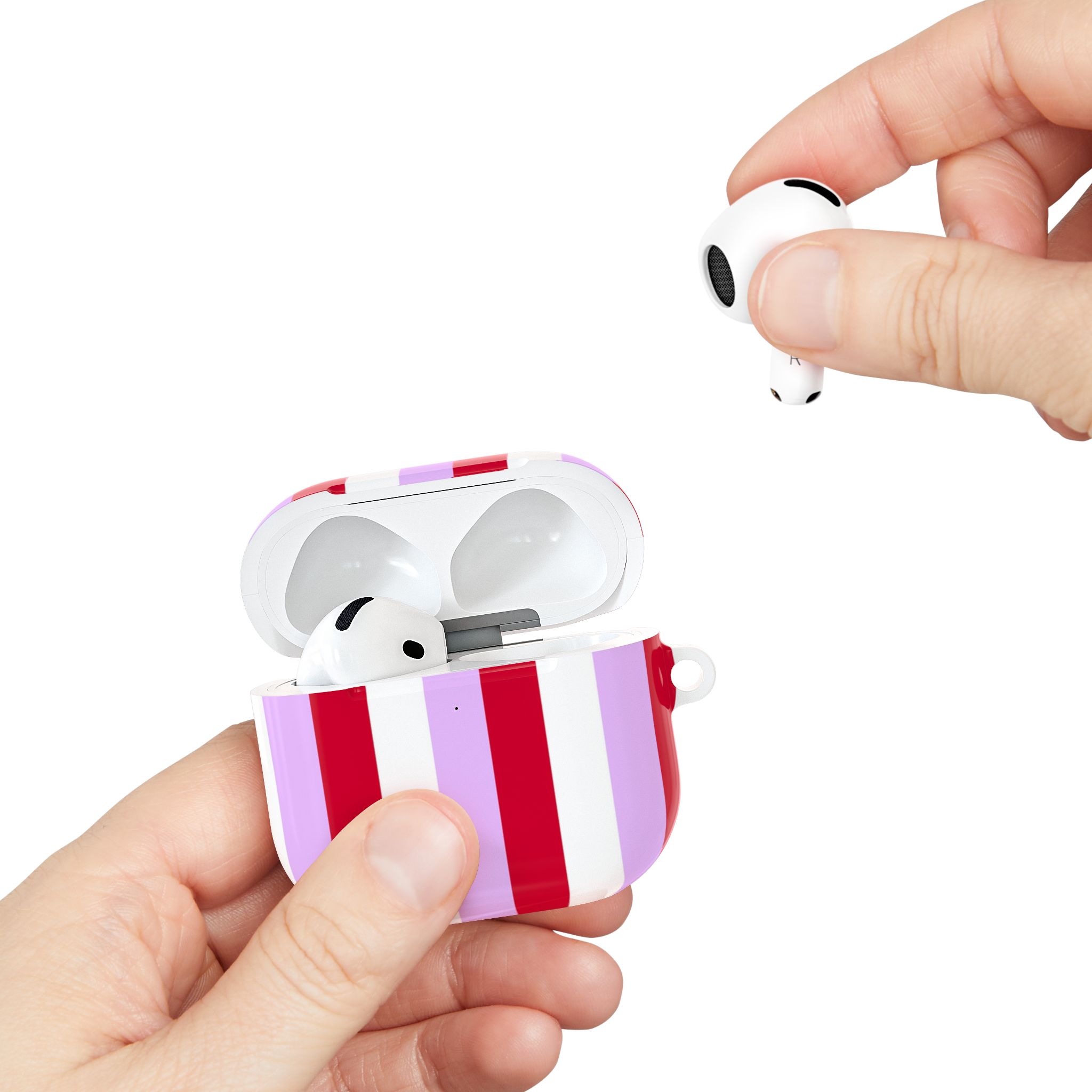 Wireless earbuds in colorful striped charging case, modern portable audio technology, innovative design, high-quality sound, and stylish accessories for music lovers.