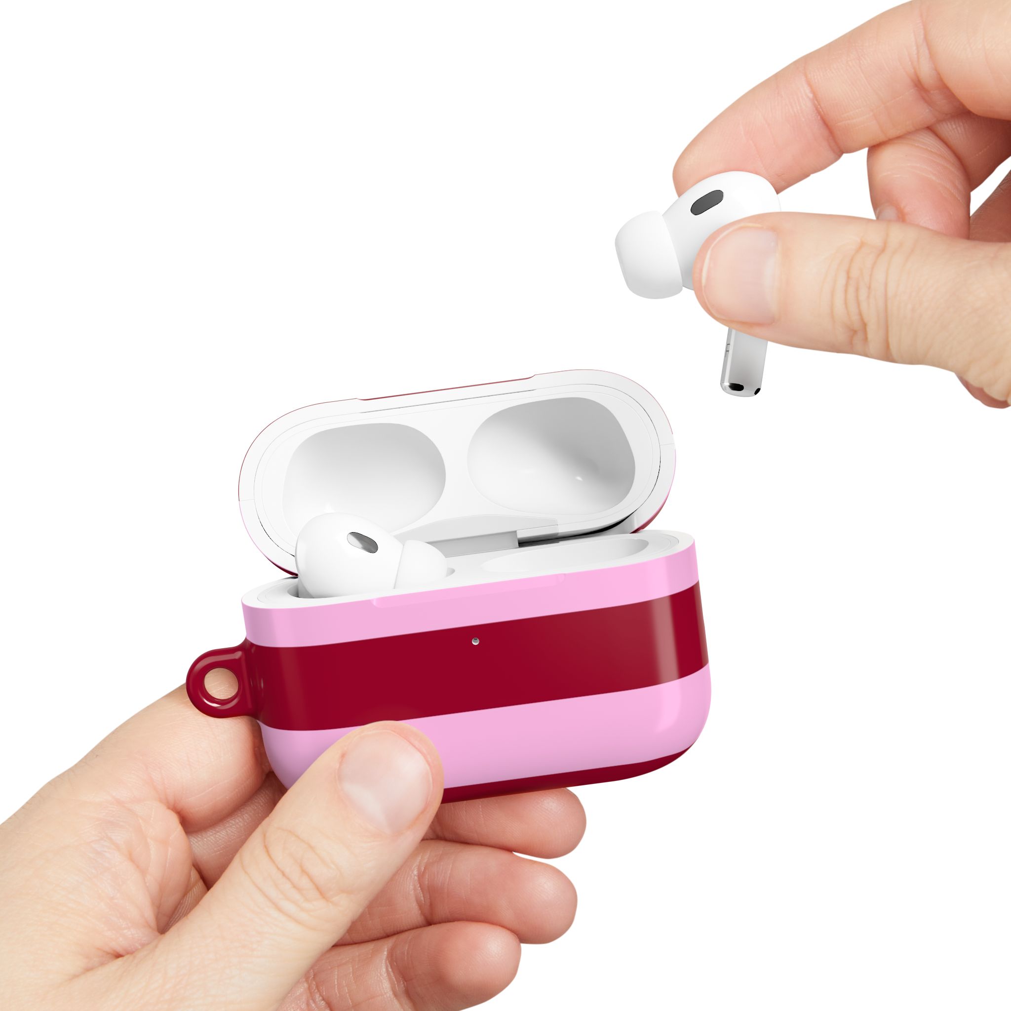 Wireless earbuds in pink and red carrying case, demonstrating portable high-quality audio technology.
