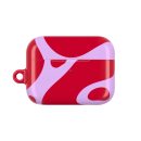 Vibrant red and pink abstract patterned AirPods case with a loop attachment for easy carrying. Perfect for stylish protection of your wireless earbuds.