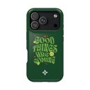 Bright green phone case with the phrase "Good Things Are Coming" in playful, bold lettering, decorated with smiley faces, stars, and a floral emblem, inspired by Florayn's positive and eco-friendly design style.